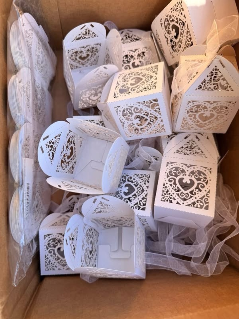 White Laser-Cut Favor Boxes with Ribbon